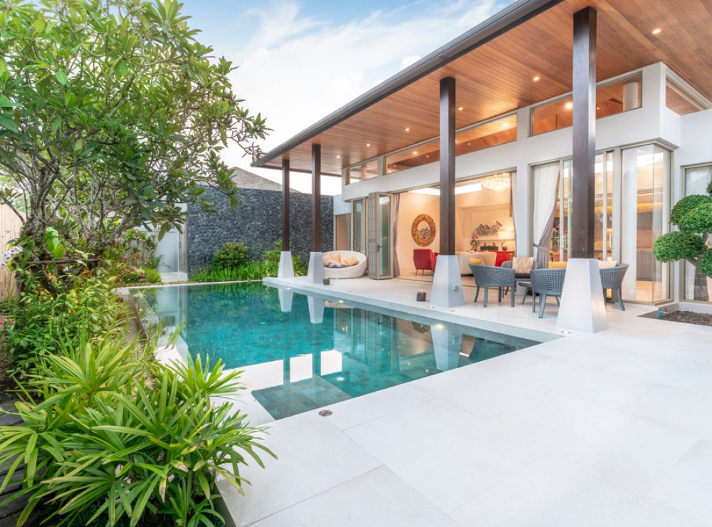 home or house Exterior design showing tropical pool villa with greenery garden,